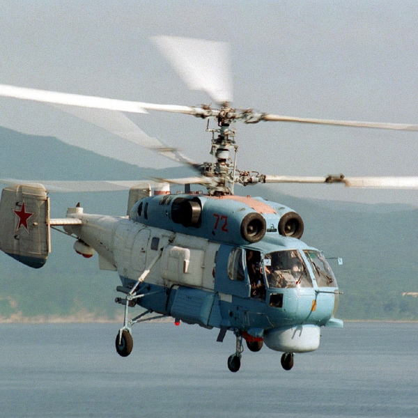 A Russian KA-27SP (Helix D) helicopter flies past the flight deck of USS BELLEAU WOOD (LHA 3) (not shown) to prepare for landing on the amphib ious assault ship during Exercise COOPERATION FROM THE SEA '96, off the coast of Vladivostok, Russia. The landing marks the first time a Russian helicopter has touched down on a US Navy ship as part of this annual exercise.